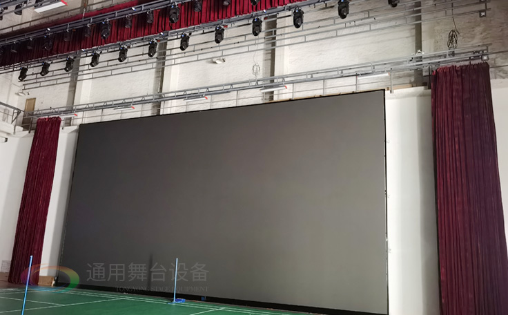 廣州黃花崗禮堂選擇通用舞臺！禮堂舞臺阻燃幕布、吊桿、舞臺燈光項目圓滿竣工！